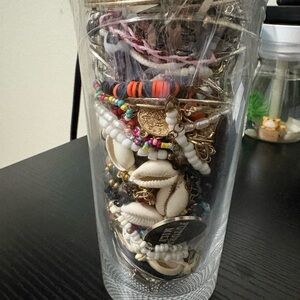 Assorted Beaded, Metal, and Shell Bracelets